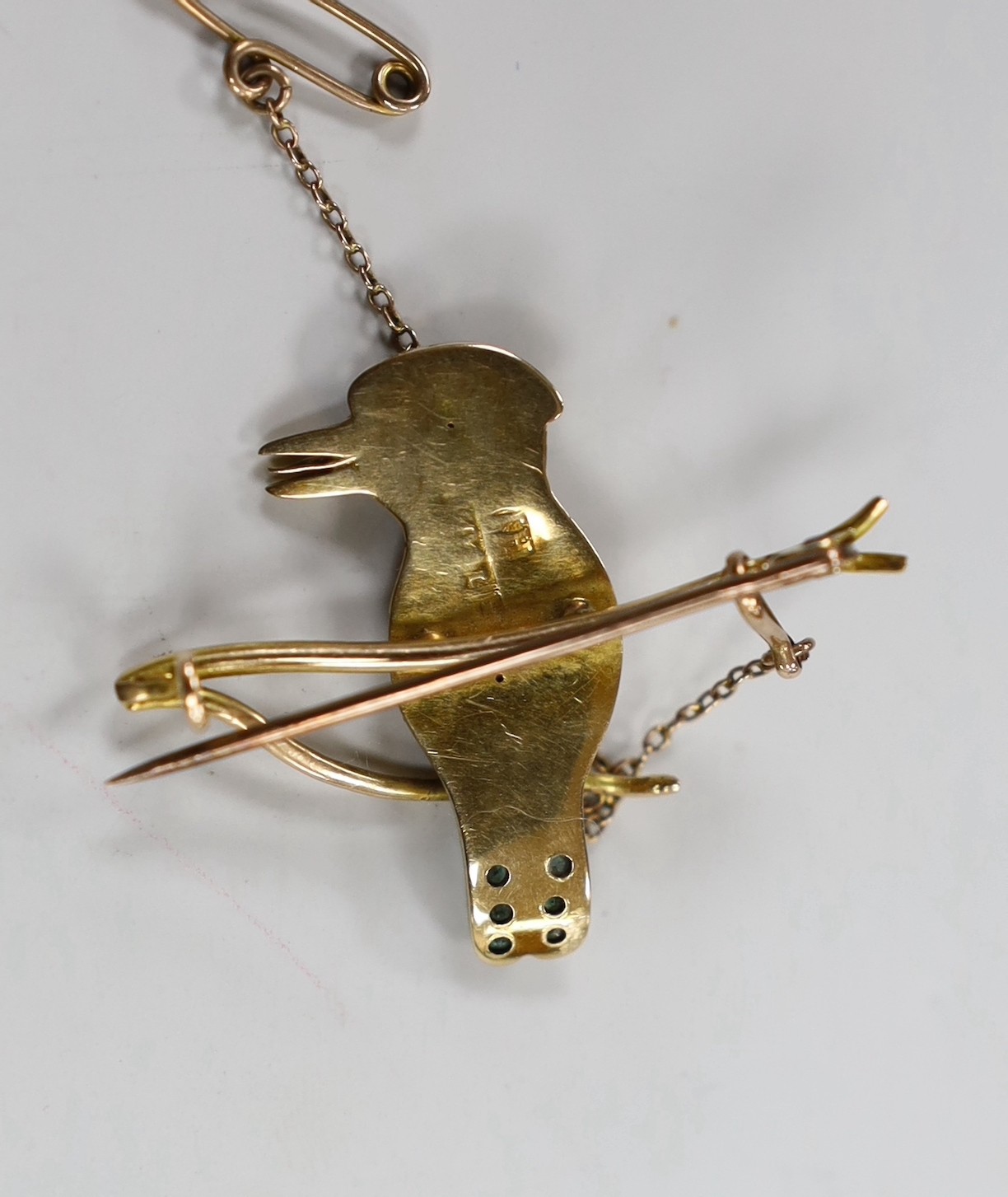 A yellow metal, split pearl ruby and emerald set Kingfisher? bar brooch, length 39mm, gross weight 6.9 grams.